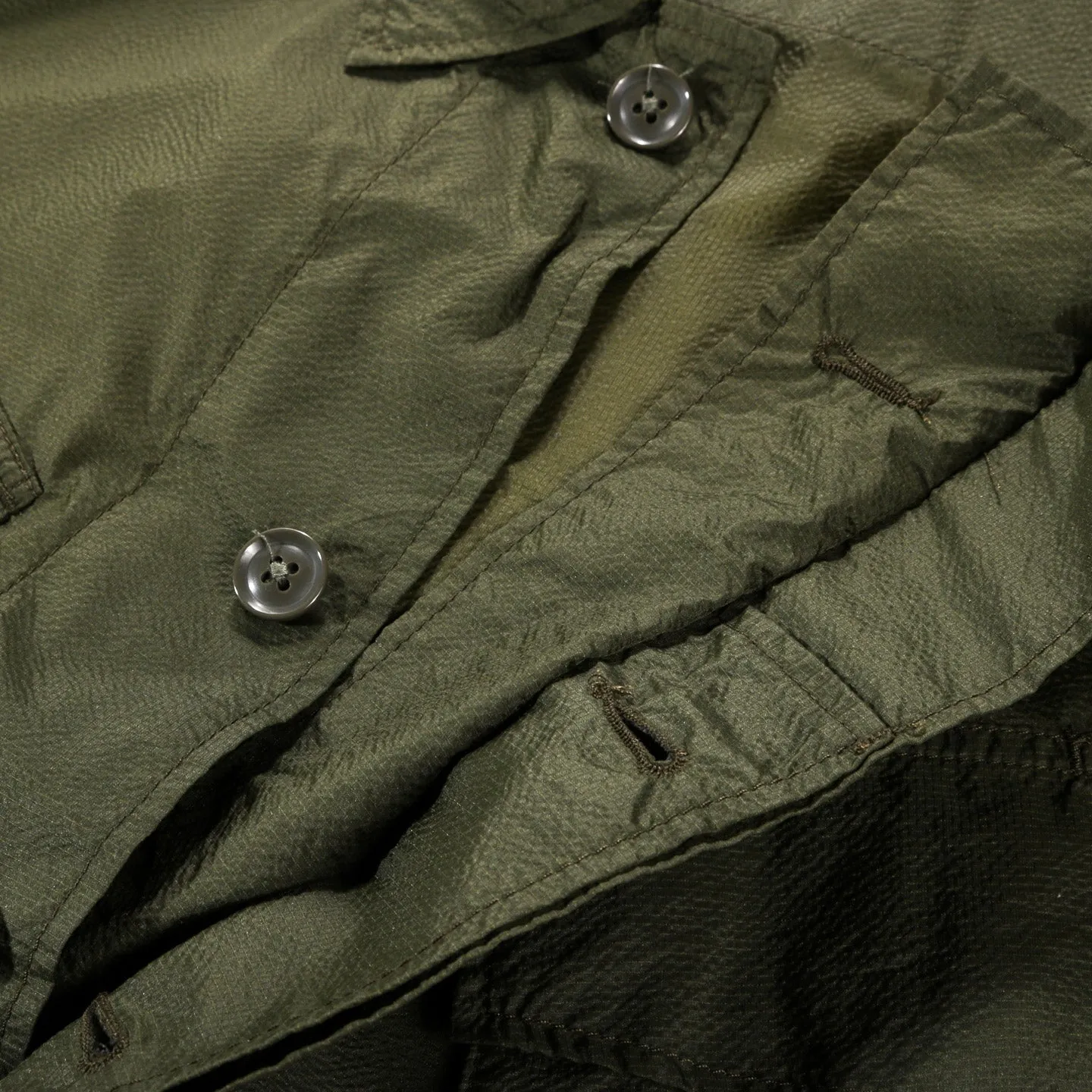 Engineered Garments Olive Nylon Micro Ripstop Jungle Fatigue Jacket.