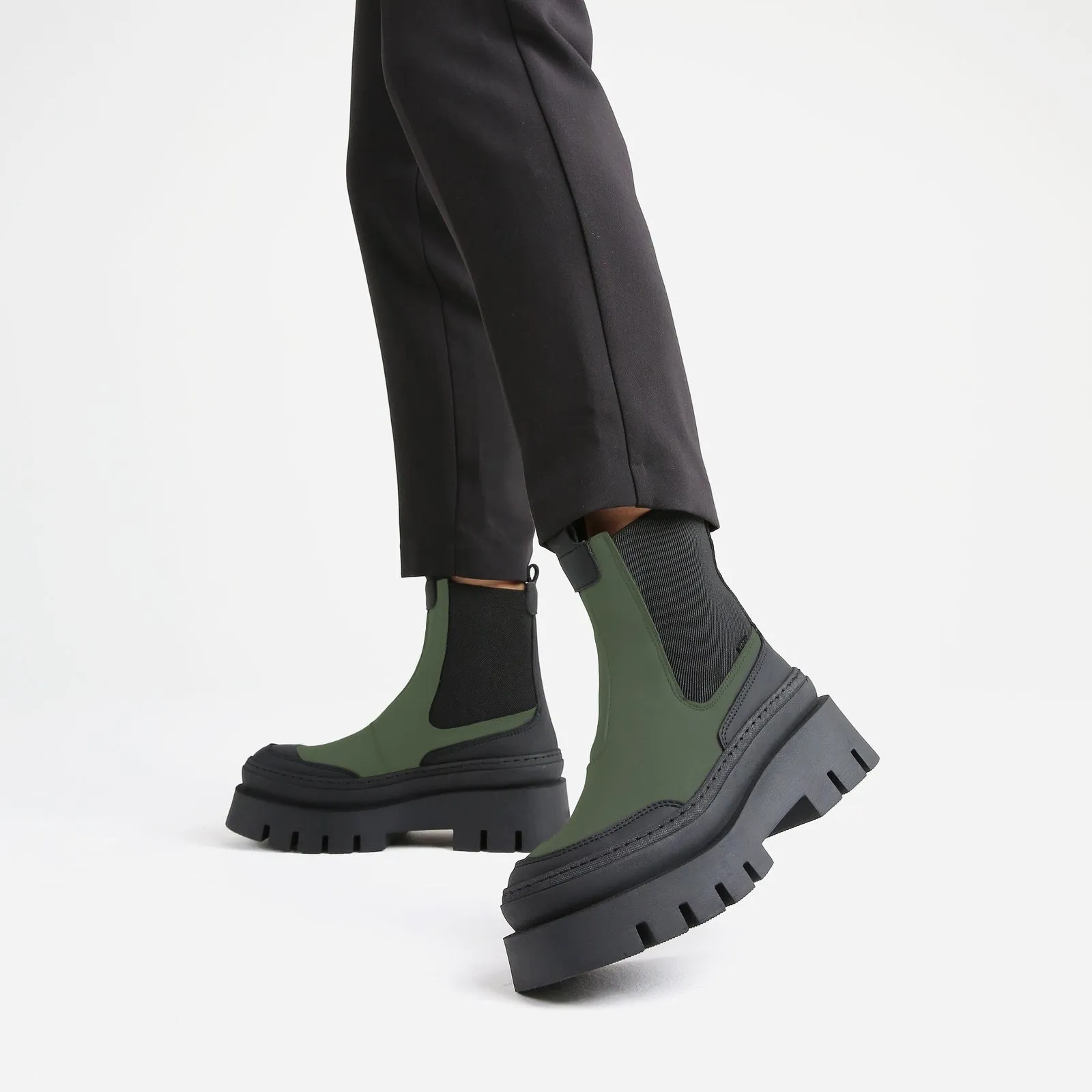 Evi Ann Khaki Black Biker Chelsea Boots can be rewritten as Stylish Khaki Black Biker Chelsea Boots by Evi Ann.