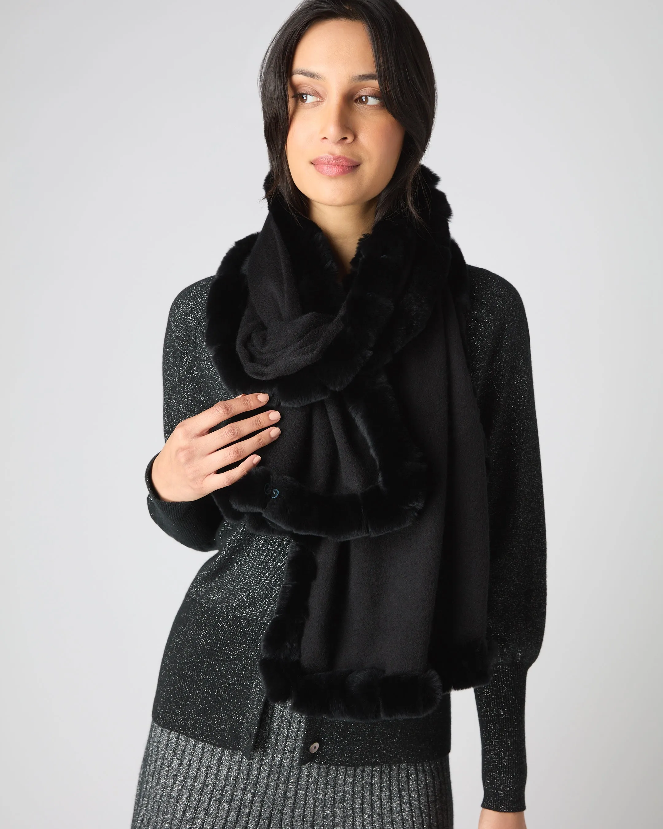 Meribel black scarf with fur trim for women.